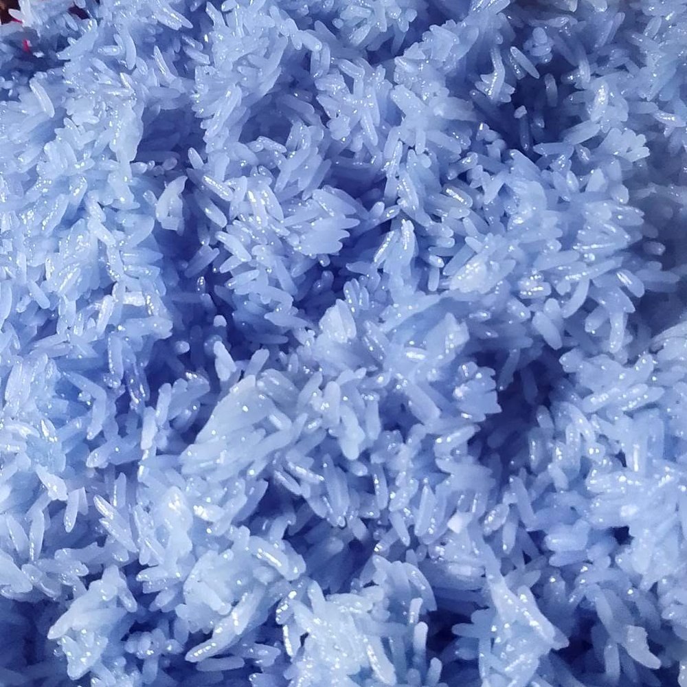 Rice coloured with butterfly pea flowers